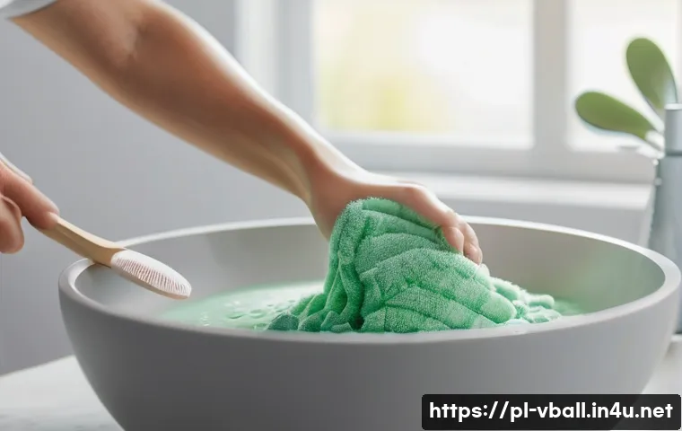 배구 관련 의류 세탁 팁 - A detailed close-up image of synthetic volleyball sportswear fabric being gently hand-washed in a ba...